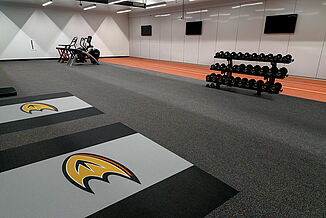 Anaheim Ducks Training Facility - Weight Training The Anaheim Ducks training facility features REGUPOL aktivpro roll, aktiv and crash flooring that promotes maximum durability. The Ducks logo is seamlessly inlaid into the flooring.
