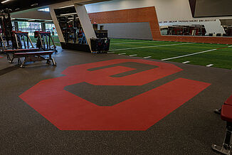 Oklahoma University Weight Training - REGUPOL aktivpro Roll with Logo REGUPOL aktivpro roll flooring demonstrating customizability at Oklahoma University