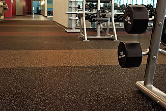 Alternating color view of REGUPOL aktiv flooring found in Horsham Athletic Club allows for prominent brand positioning and durable flooring for members.