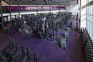 Full view of TCU football performance center. The room offers athletes a variety of equipment and tools to strengthen performance.