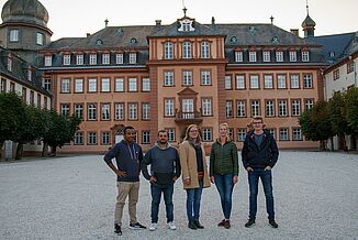 Group photo with Nathalie zu Sayn-Wittgenstein in front of the castle in Bad Berleburg