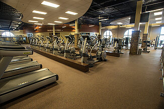 Elipticals in the Team 85 facility, all resting on REGUPOL aktiv flooring, providing a strong and durable foundation.