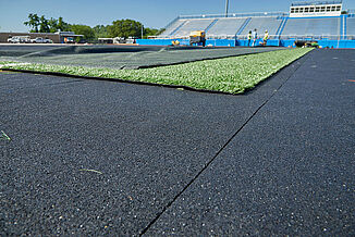 Enhanced view of the Spring Grove Area High School's new construction turf area, featuring REGUPOL abzorb beneath the turf.