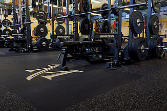Millersville University performance center weight racks utilize REGUPOL crash platforms that are seamlessly inlaid into the floor to provide a safe, flat surface for athletes.
